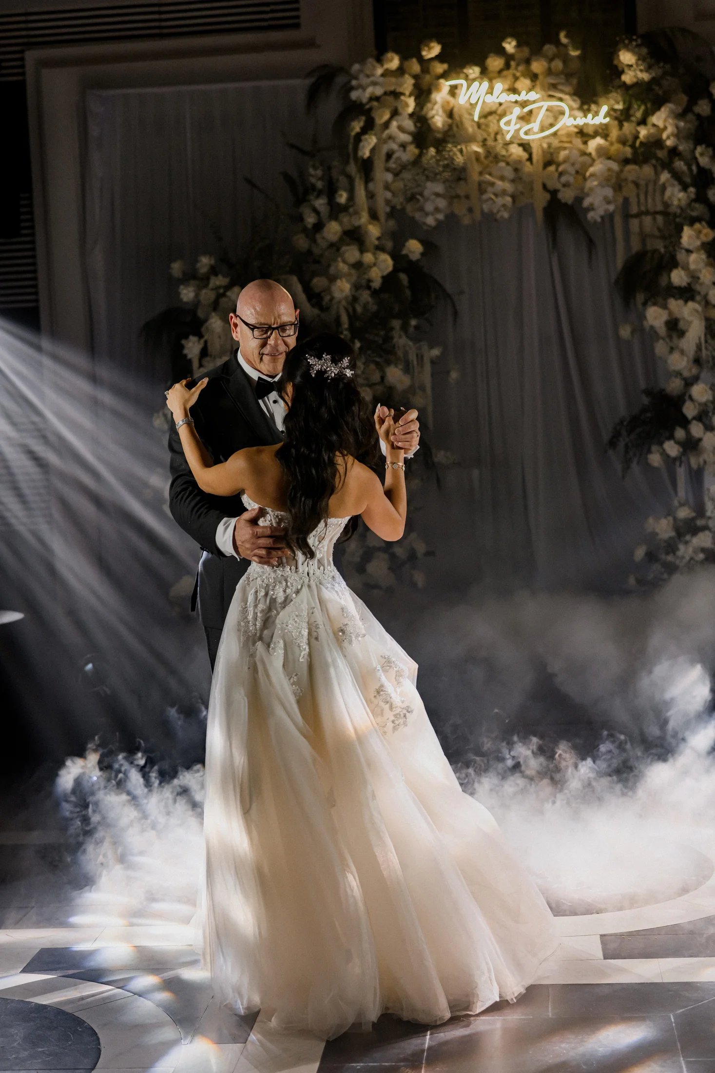 Wedding production with theatrical light, atmosphere and first dance